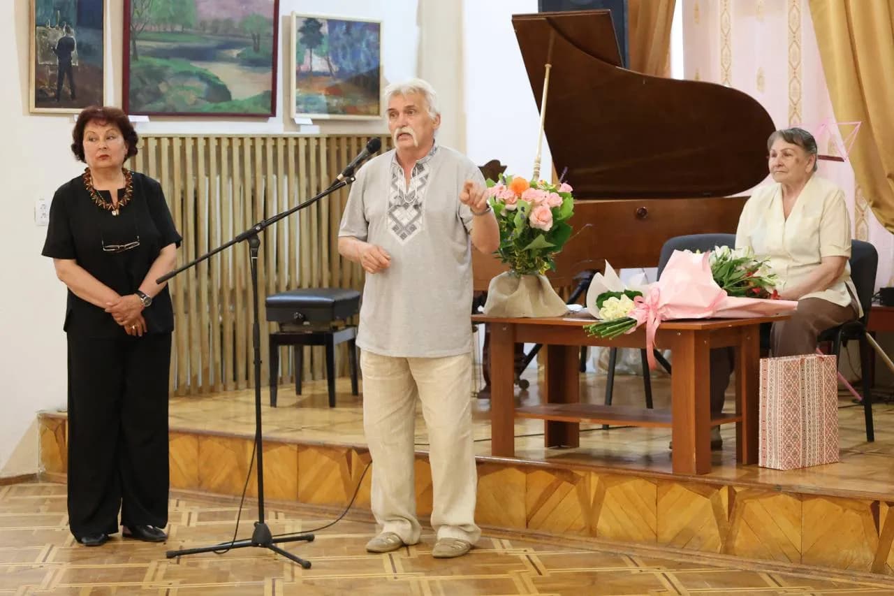 директорка Музею історії релігії Галина Гриник та художник Сергій Солодкий